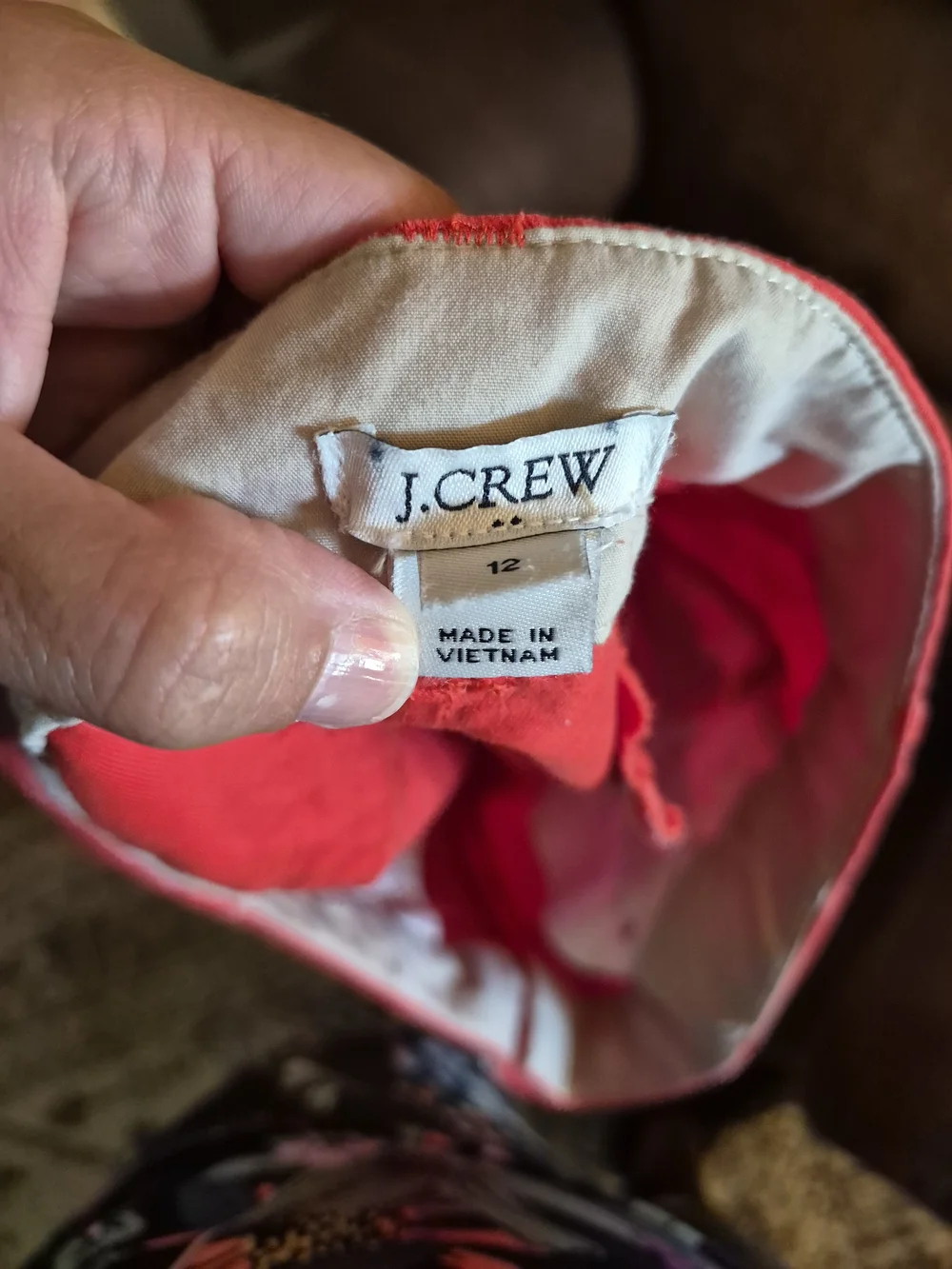 vibrant J.Crew coral 4-inch chino shorts featuring a classic mid-rise fit